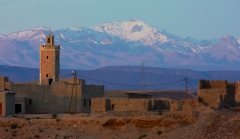 A small town in an oasis on a desert plain at the foot of the Atlas Mountains.